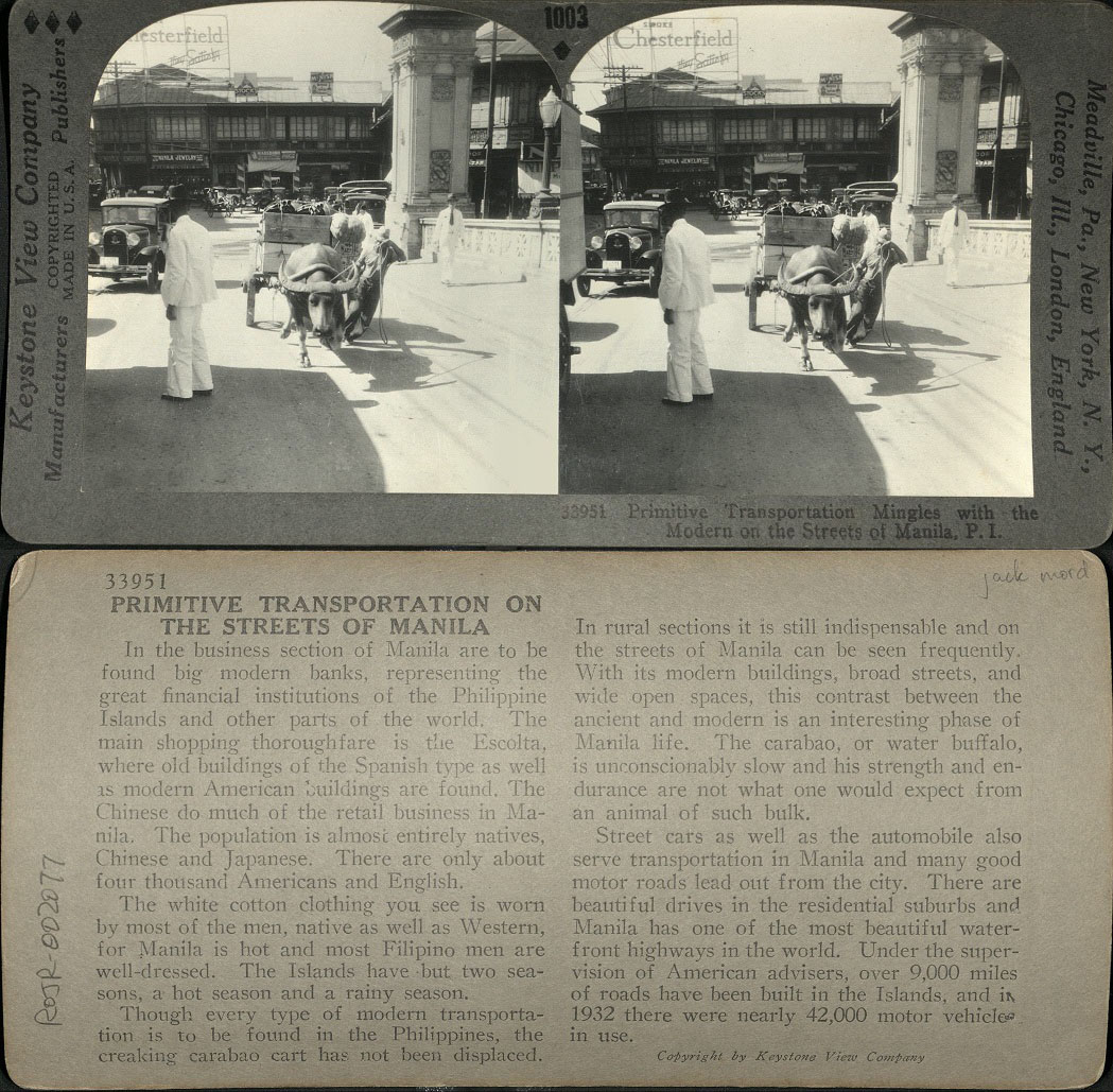 Primitive Transportation Mingles with the Modern on the Streets of Manila, P. I.